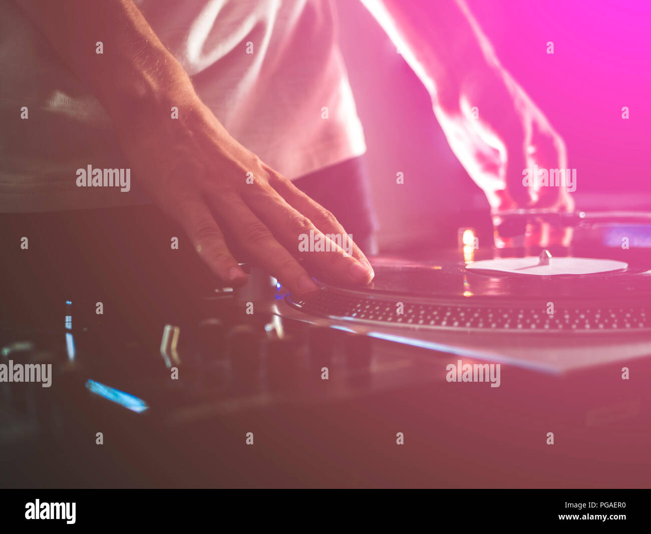 dj hands on professional music equipment deck vinyl record turntable