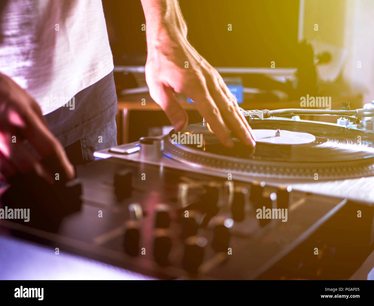 Close Up Dj Hand Play Music On Turntable Record Setup At Home Party Tomed Vintage Look Stock Photo Alamy