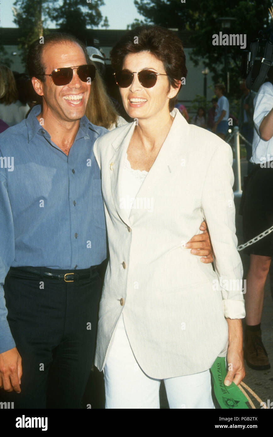 WESTWOOD, CA - AUGUST 3: Producer Jeffrey Katzengberg and wife Marilyn Katzenberg attend 'An Evening at the Net' Tennis Tournament to Benefit Revlon/UCLA Women's Cancer Research on August 3, 1992 at UCLA's Los Angeles Tennis Center in Westwood, California. Photo by Barry King/Alamy Stock Photo Stock Photo