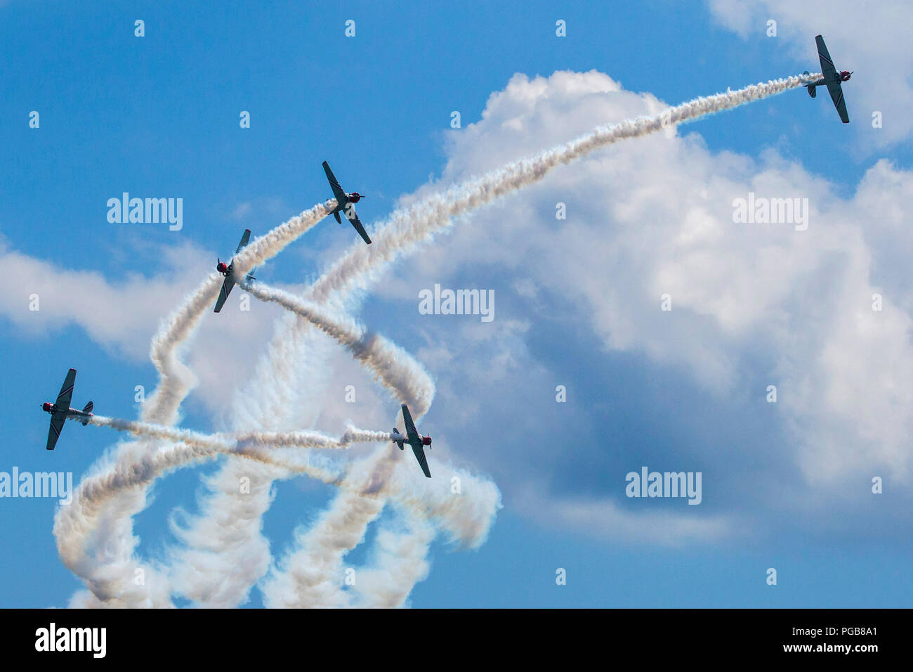 The GEICO Skytypers SNJ-2 Texans perform at the 2018 Atlantic City International Airshow “16th Annual Thunder Over The Boardwalk” at Atlantic City, N.J., Aug. 22, 2018. The SNJ-2 is a variant of the T-6 Texan advanced trainer aircraft used to train pilots from World War II until the 1970s. (New Jersey National Guard photo by Mark C. Olsen) Stock Photo
