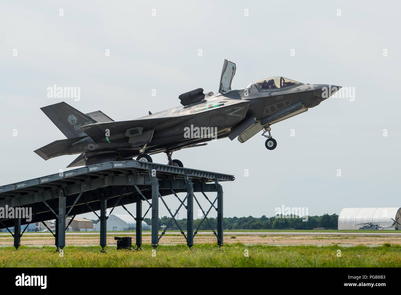 U.S. Marine Corps Maj. Michael Lippert, F-35 Pax River ITF test pilot, completes an asymmetric ski jump at Naval Air Station Patuxent River, Maryland, Aug. 16, 2018, as part of the Queen Elizabeth workups in preparation for the First of Class Flight Trials (Fixed Wing) aboard Britain’s newest aircraft carrier, HMS Queen Elizabeth.   Lippert, along with ITF pilots Royal Navy Cdr. Nathan Gray, Royal Air Force Sqn. Ldr. Andy Edgell and BAE Systems Peter Wilson, and nearly 200 ITF experts will embark with two F-35B test jets, and several sensors and data recorders to evaluate the fifth-generation  Stock Photo