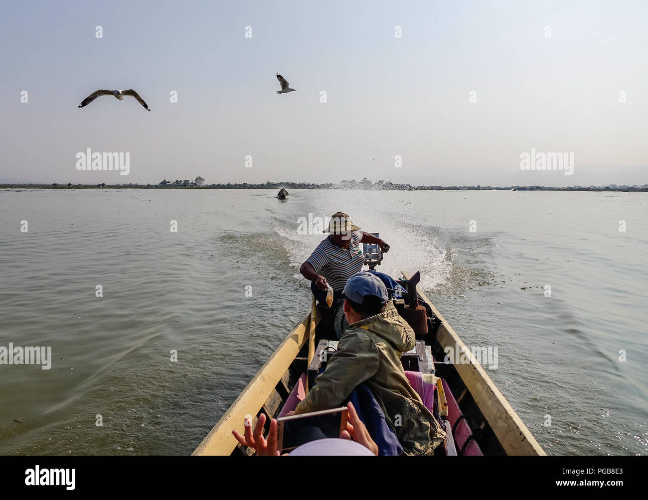 Inle, Myanmar - Feb 15, 2016. Speed boat running on Inle (Inlay) lake ...