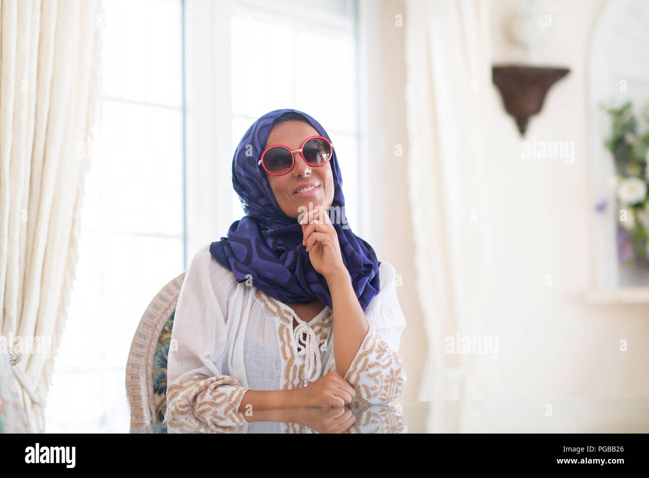 Middle Age Brunette Arabian Woman Wearing Colorful Hijab At Luxury middle-age-brunette-arabian-woman-wearing-colorful-hijab-at-luxury