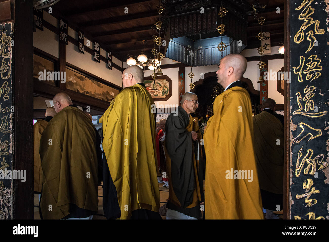 Okayama, Japan Buddhist monks are praying during ceremony at temple in