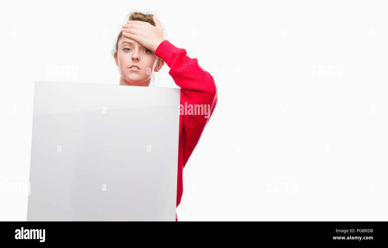 Young Blonde Woman Holding Advertising Banner Stressed With Hand