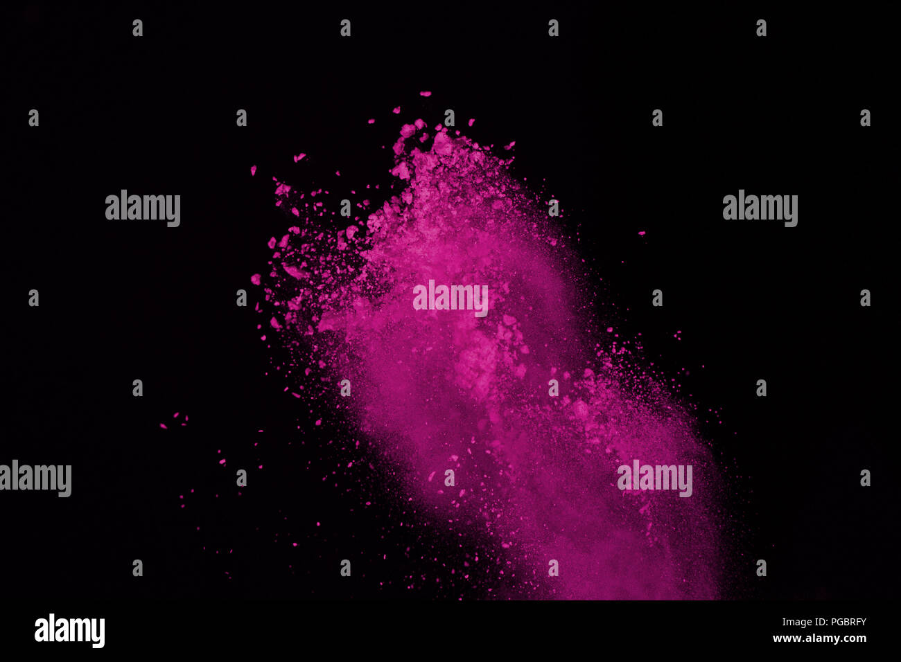 Abstract pink powder explosion on black background. abstract colored ...