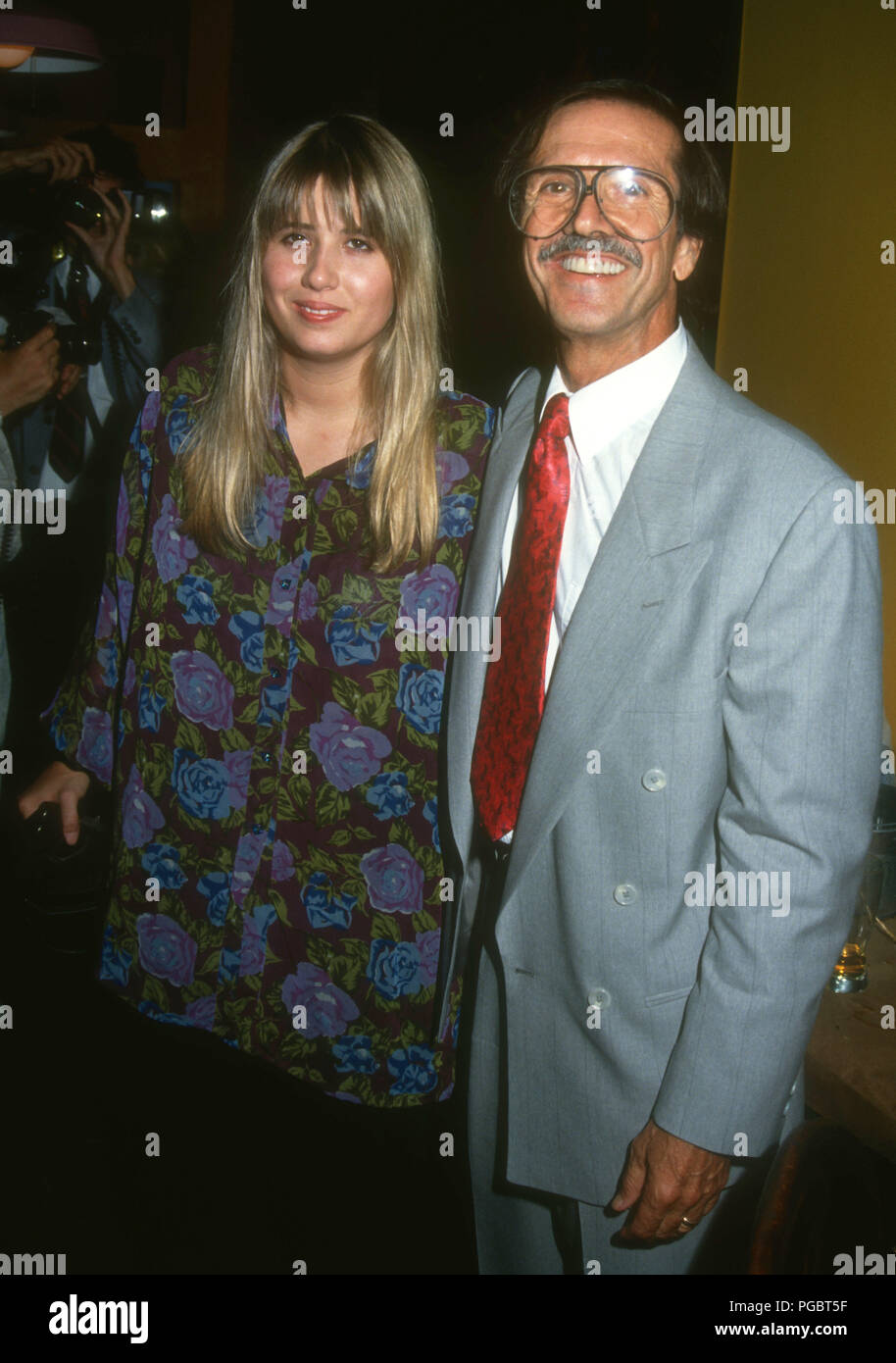 WEST HOLLYWOOD, CA - AUGUST 11: (L-R) Chastity Bono (Chaz Bono) and father Sonny Bono attend Grand Opening of Bono's Restaurant on August 11, 1992 at Bono's Restaurant on Melrose Avenue in West Hollywood, California. Photo by Barry King/Alamy Stock Photo Stock Photo
