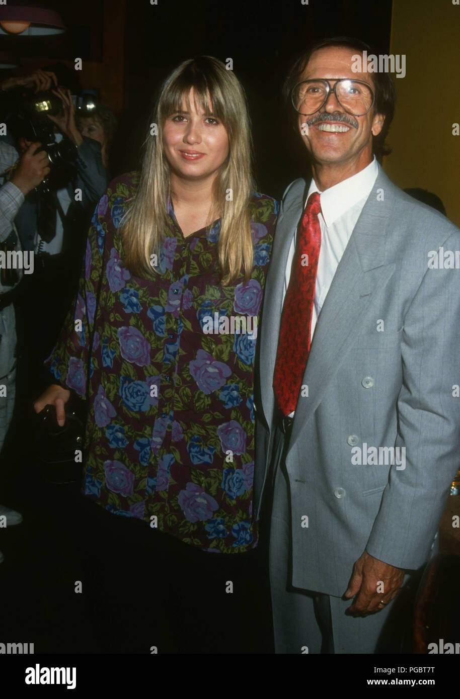 WEST HOLLYWOOD, CA - AUGUST 11: (L-R) Chastity Bono (Chaz Bono) and father Sonny Bono attend Grand Opening of Bono's Restaurant on August 11, 1992 at Bono's Restaurant on Melrose Avenue in West Hollywood, California. Photo by Barry King/Alamy Stock Photo Stock Photo