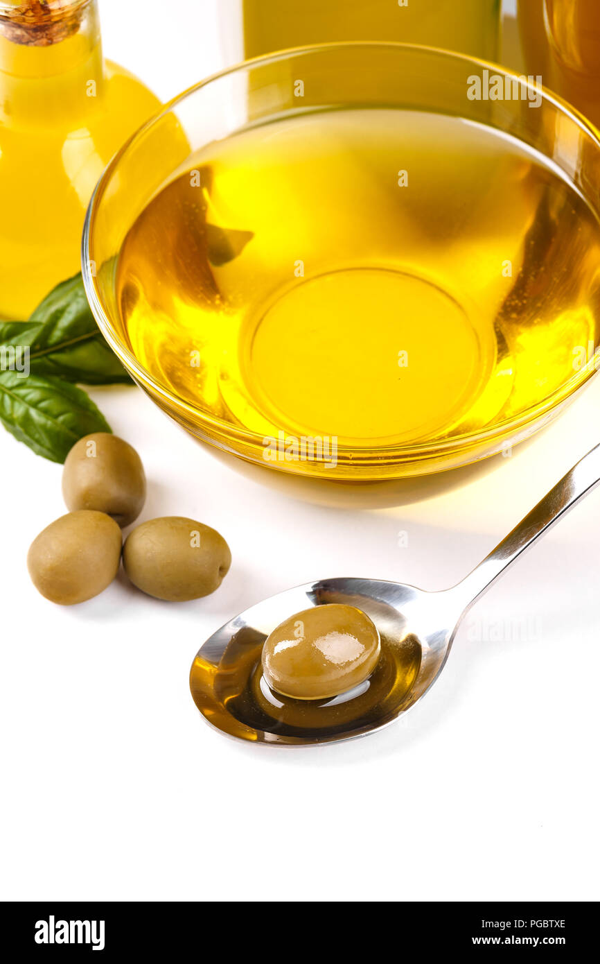 Healthy extra virgin olive oil and green olives Stock Photo - Alamy