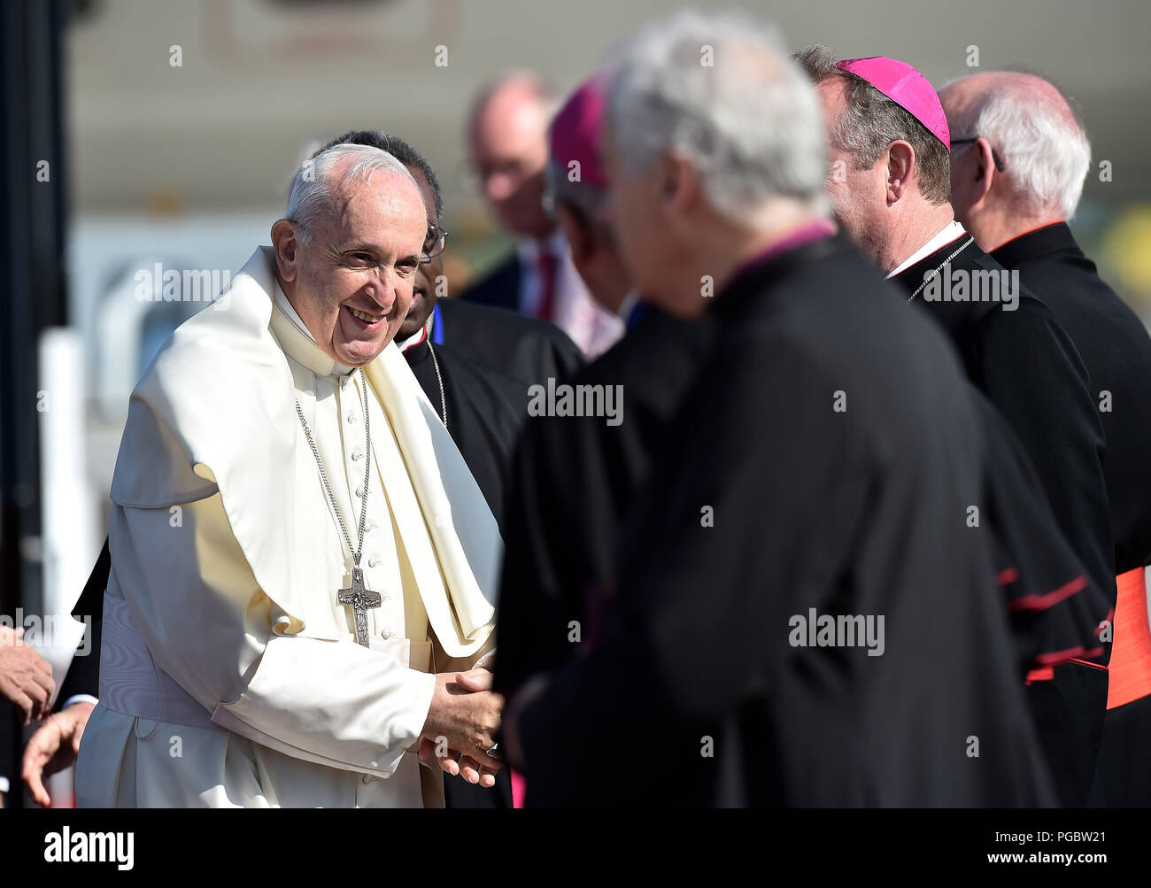 Pope Francis greets the clergy upon arrival as he arrives at Dublin Airport as he arrives at Dublin Airport as he arrives at Dublin International Airport, at the start of his visit to Ireland. Stock Photo