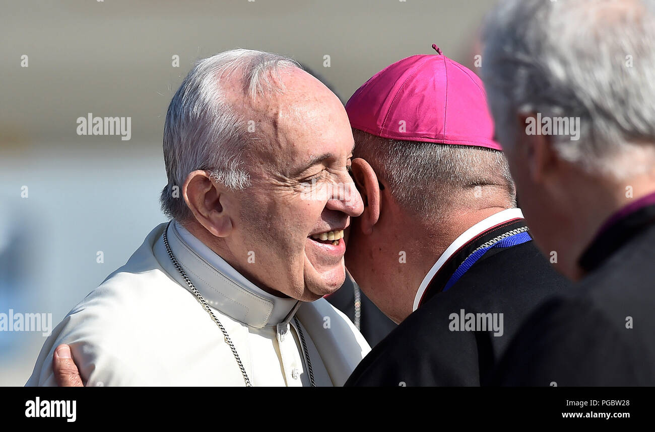 Pope Francis greets the clergy as he arrives at Dublin Airport as he arrives at Dublin Airport as he arrives at Dublin International Airport, at the start of his visit to Ireland. Stock Photo