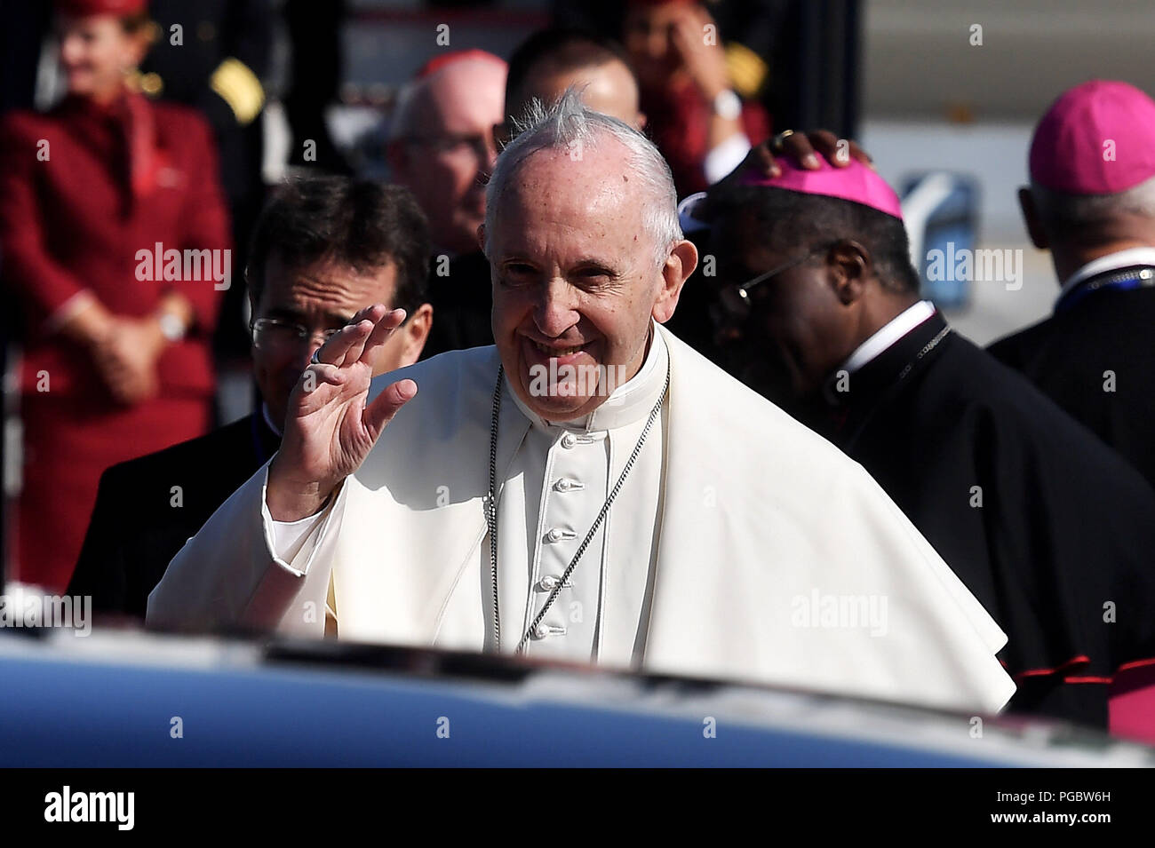 Pope Francis waves to wellwishers as he arrives at Dublin Airport as he arrives at Dublin International Airport, at the start of his visit to Ireland. Stock Photo