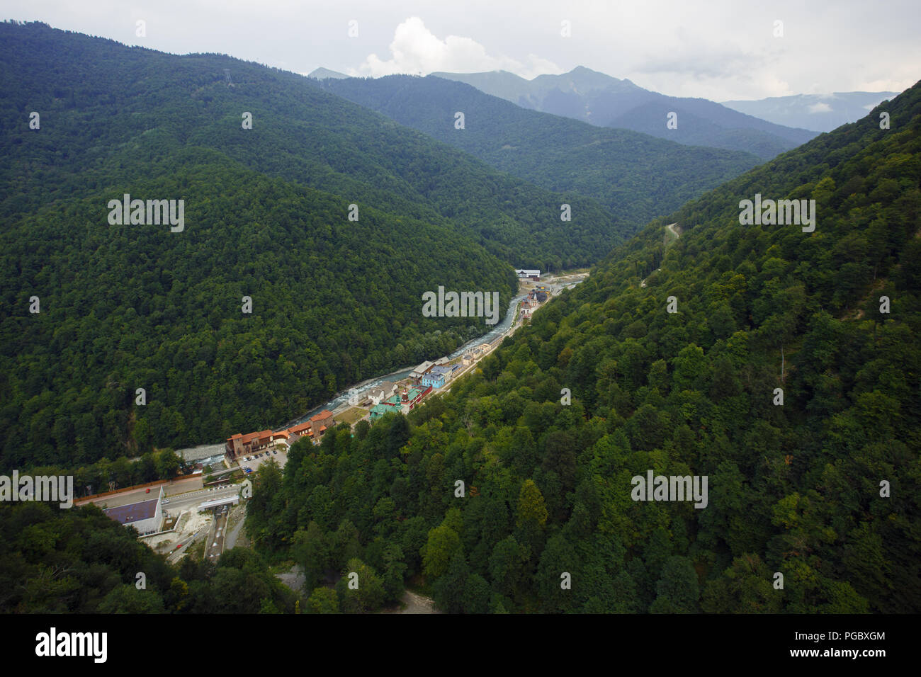 SOCHI, RUSSIA, AUG, 08, 2017: View on Rosa Khutor Dramatic sky. Sochi Roza Khutor holidays vacation bike ski tours Stock Photo