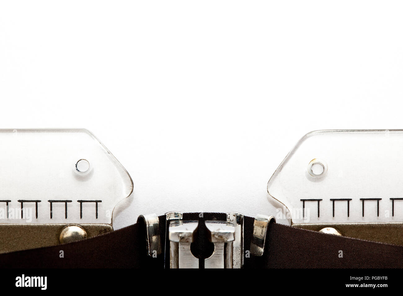 Empty white paper page on retro typewriter with copy space. Stock Photo