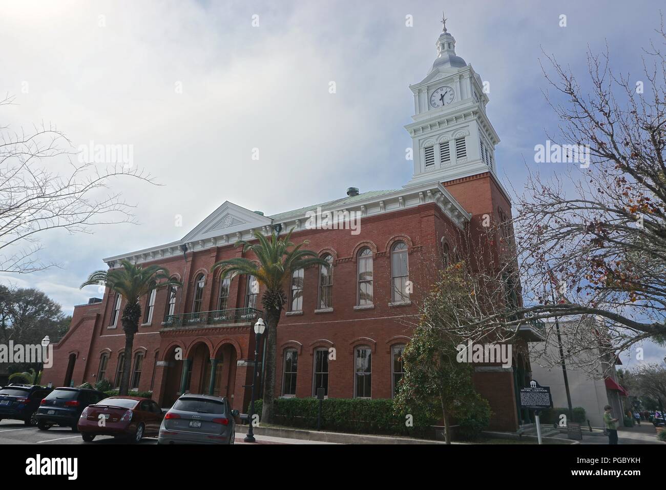 Fernandina Beach, FL, USA: The Classical Revival style Old Nassau County Courthouse (1891) features Corinthian columns and a bell tower and steeple. Stock Photo