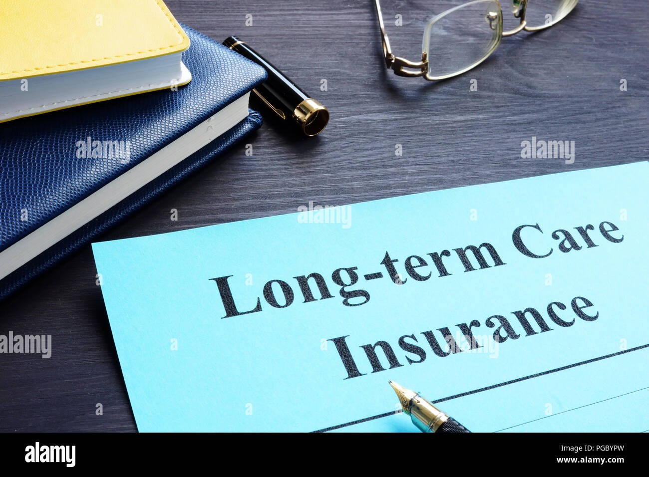 Long term Care Insurance policy on a table. Stock Photo