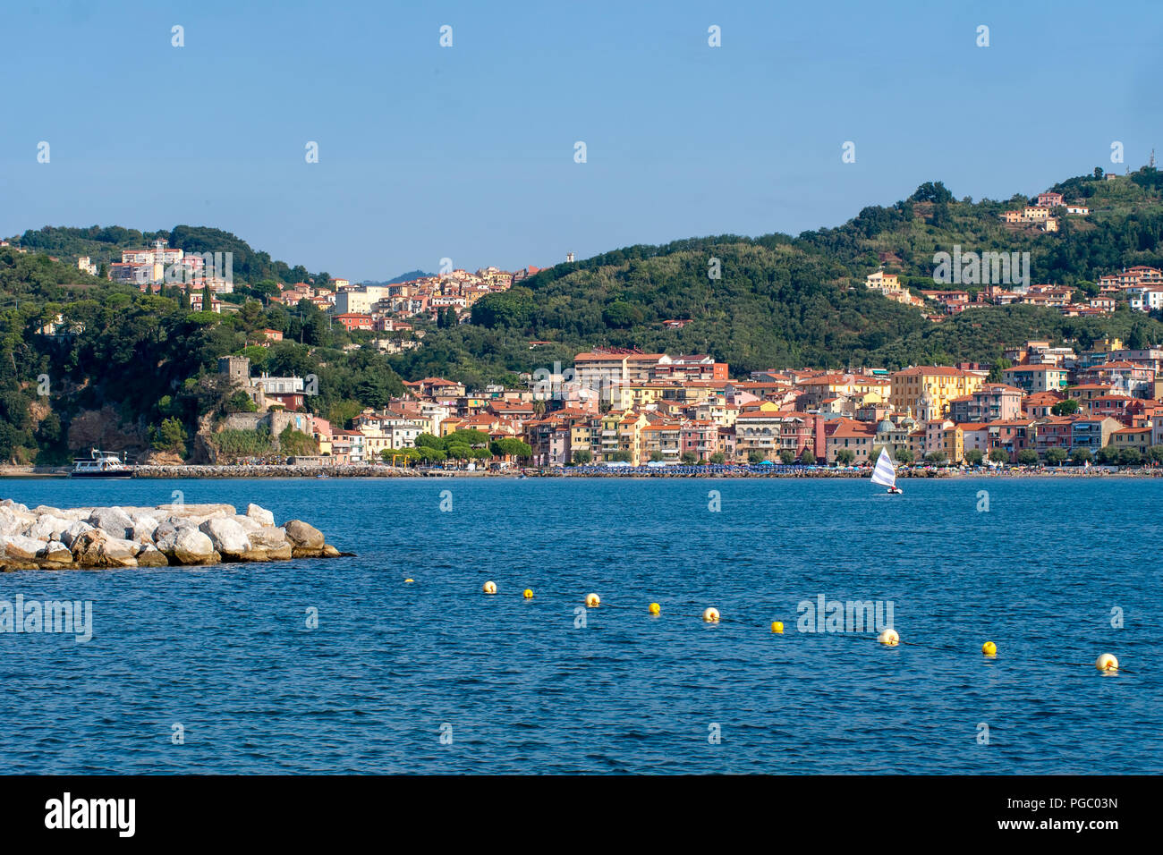 LERICI, LIGURIA, ITALY - AUGUST 18, 2018: View across the bay of popular tourist destination of Lerici to San Terenzo village. Mediterranean coast, Italy. Busy sunny summer day. Stock Photo