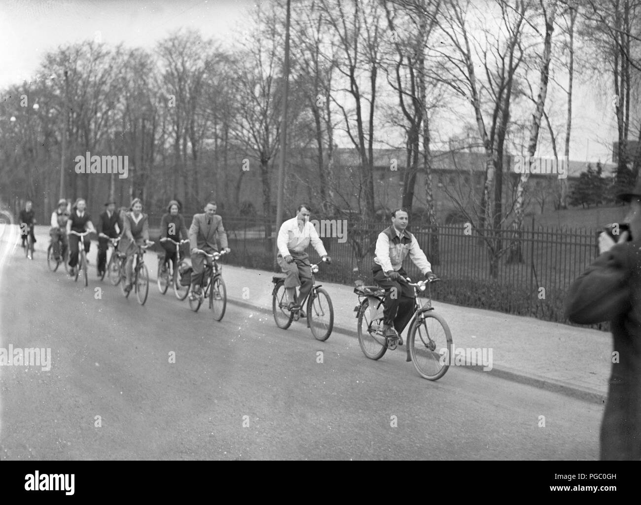1940s cyclists. People on bicycles in Stockholm are participants of a lokal associations event to encrease the use of bicycles in every day life. 7 May 1940.  Photo Kristoffersson 120-10 Stock Photo