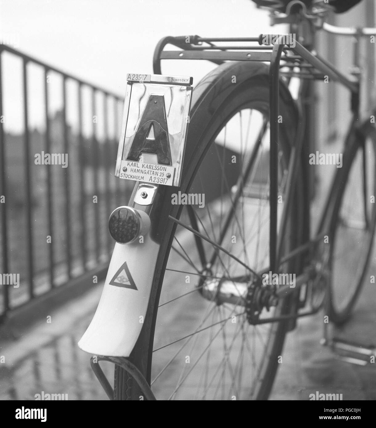 1940s bicycle. In sweden bicycles used registration signs with the owners name and registration number, as a sign of the owner having paid their bicycle tax. Sweden 1942  Photo Kristoffersson A51-3 Stock Photo