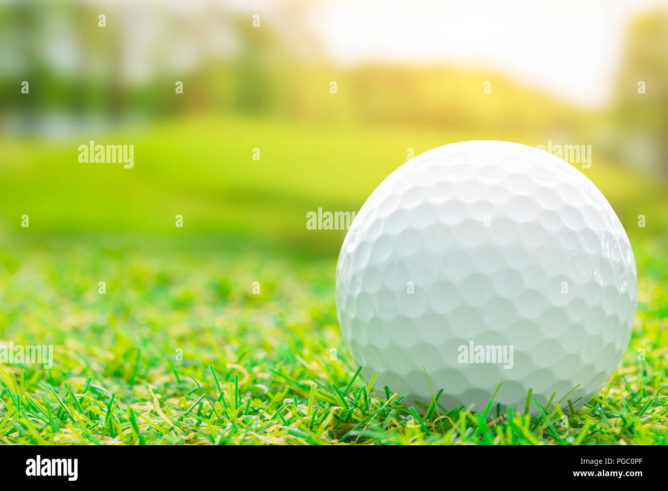 Golf ball on green course outdoor sport play for business startup lunch concept Stock Photo