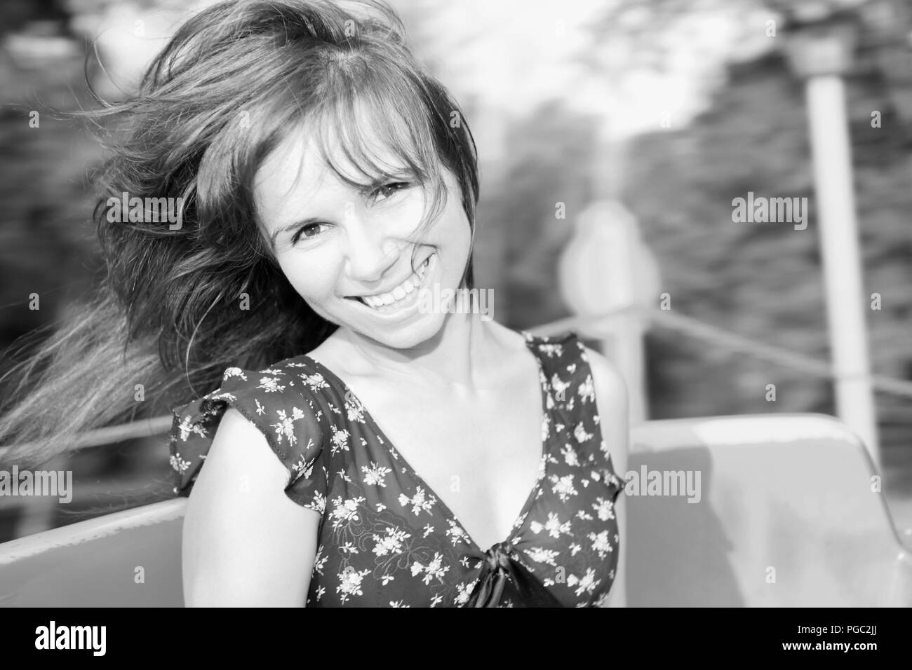 portrait of smiling girl with a flying hair Stock Photo