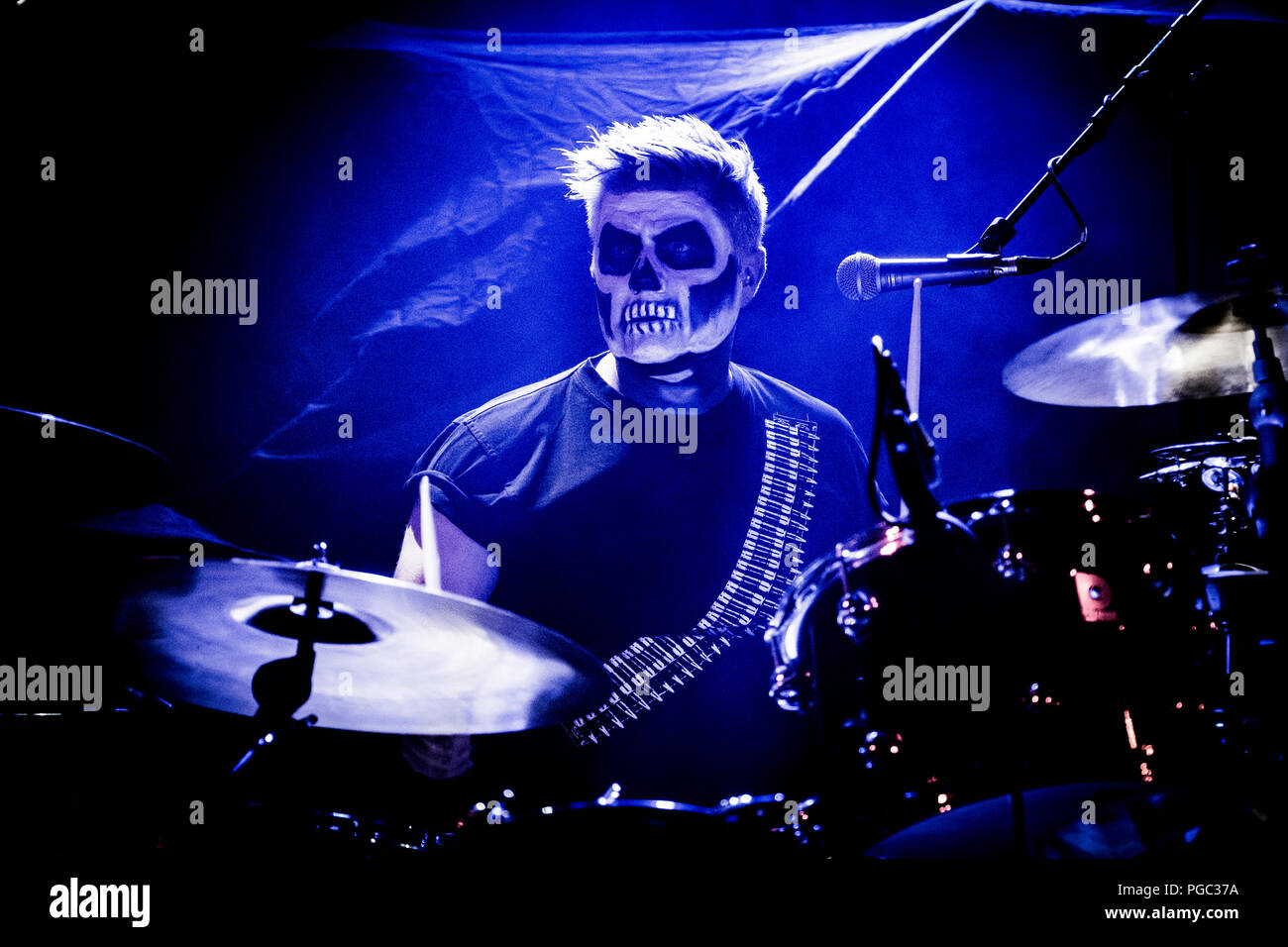 Denmark, Copenhagen - August 20, 2018. The Danish psychobilly, surf punk  band Hola Ghost performs a live concert at VEGA in Copenhagen. Here drummer  Kristian Sandorff is seen live on stage. (Photo