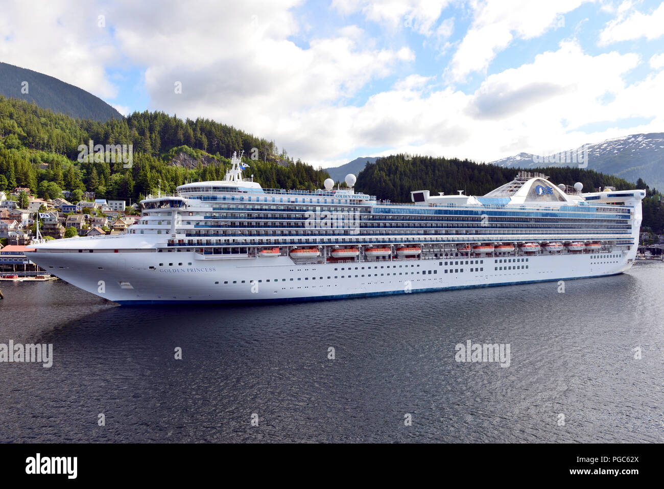 Golden Princess a Grand-class cruise ship with Princess Cruises docked at Ketchikan harbor, Alaska during leisure cruise of Alaska's Inside Passage. Stock Photo