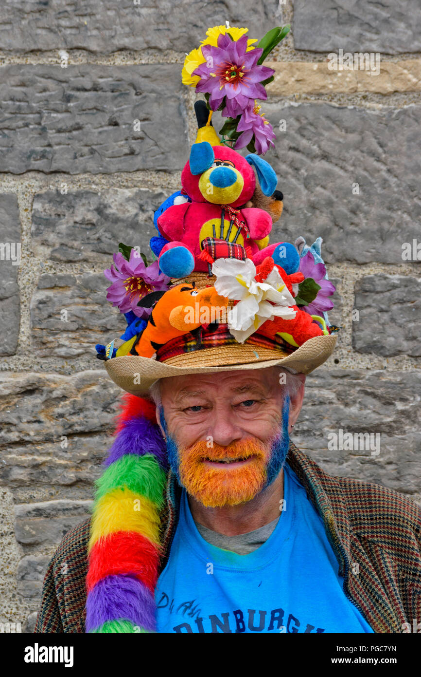 EDINBURGH SCOTLAND FESTIVAL FRINGE COLOURFUL FESTIVAL HAT AND BEARD Stock Photo