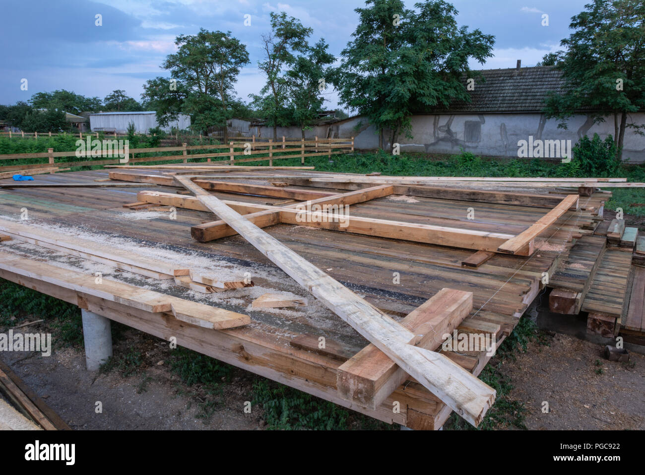 Wooden support beams and a template of the frame of the house A-frame type Stock Photo