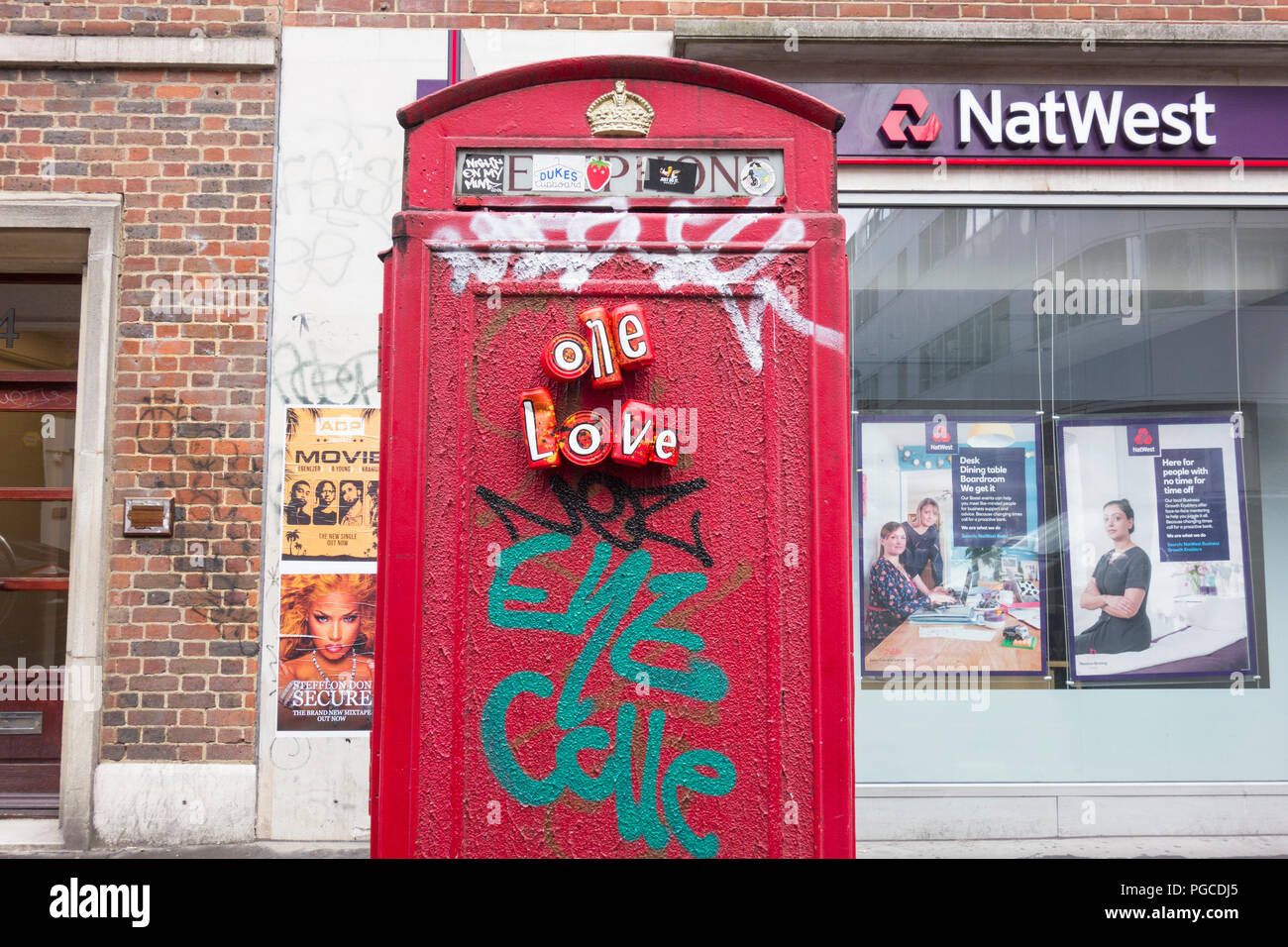 One Love drink can installation on Dean Street, Soho, London, UK Stock Photo