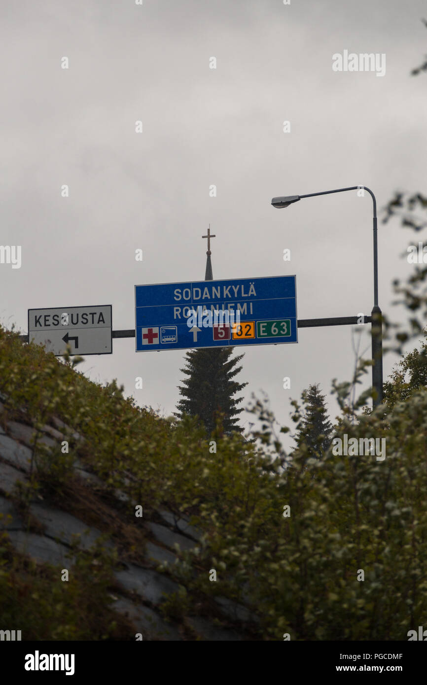 Kemijärvi Finland, sign telling the direction of where Rovaniemi and Sodankylä are on a rainy day Stock Photo