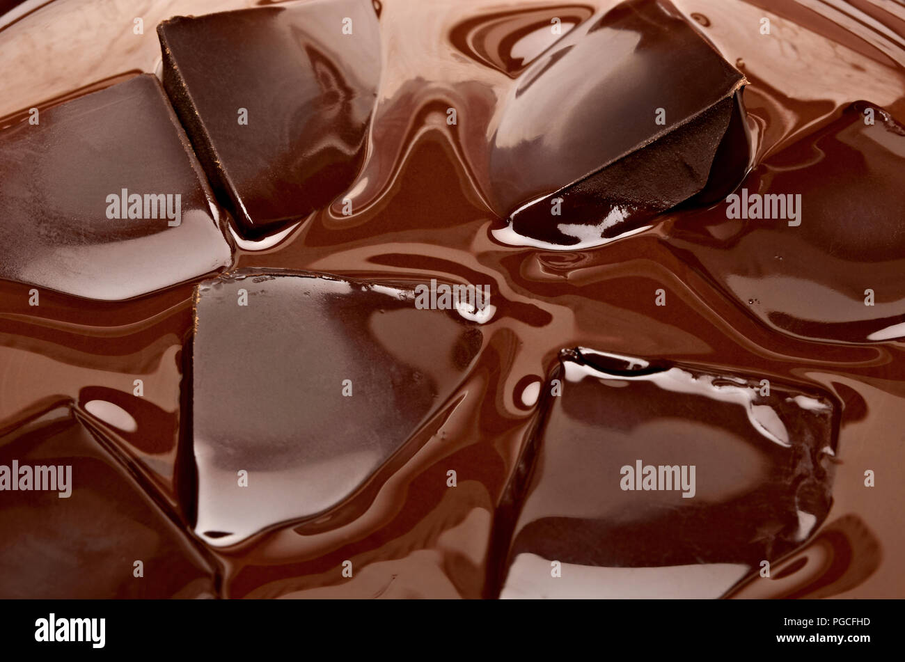 Melting chocolate with chocolate bars in bowl Stock Photo Alamy