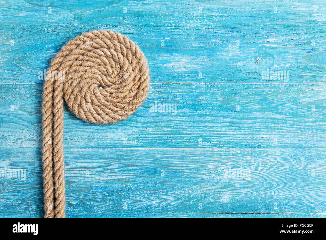 Rope, knot and background wood Stock Photo