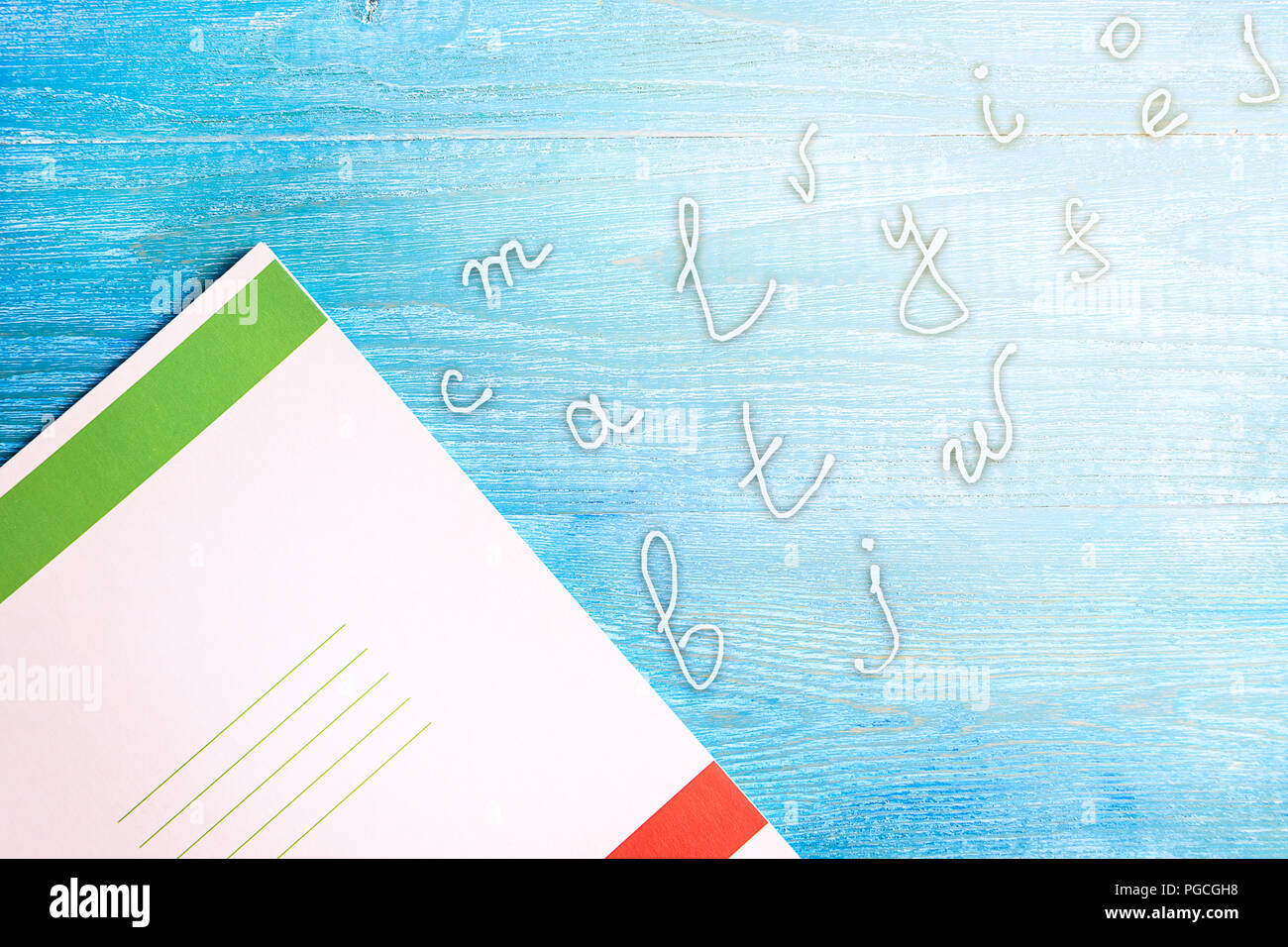 Notebook, letters and wooden background Stock Photo - Alamy