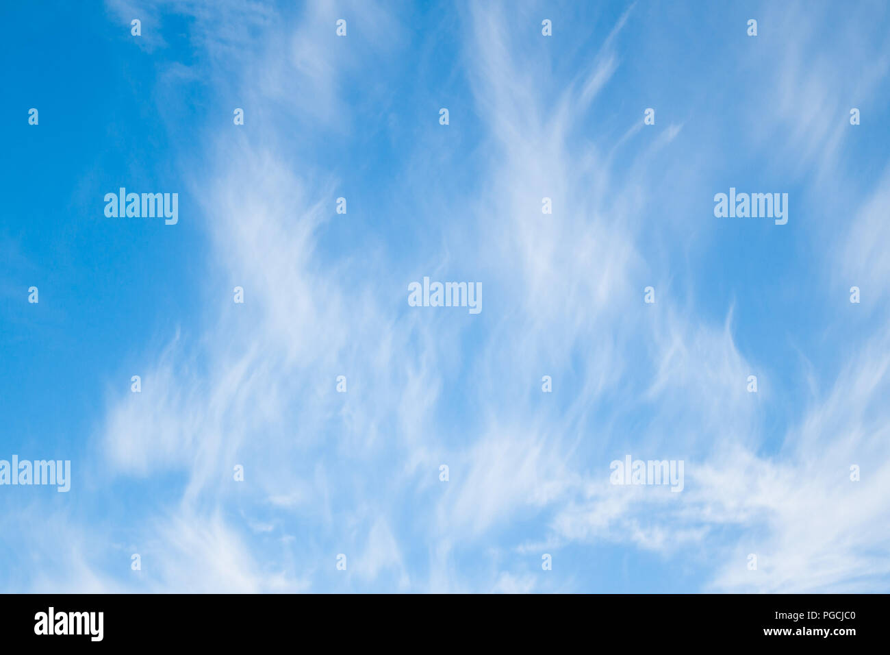 Blue sky with white abstract clouds background Stock Photo - Alamy