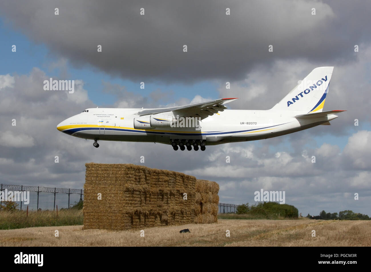 Antonov Airlines An-124 on approach into Wattisham Airfield, Suffolk. This large cargo aircraft is returning AAC Apaches helicopters from the USA. Stock Photo