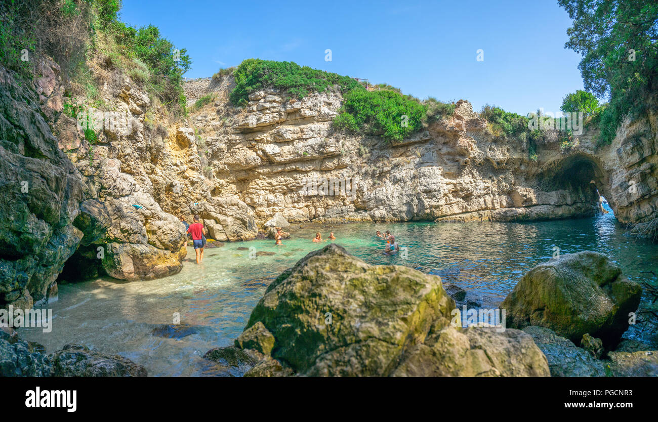 A natural pool called Bagni della Regina Giovanna, near to Sorrento in Italy is a popular swimming hole for local and adventuous holiday makers Stock Photo
