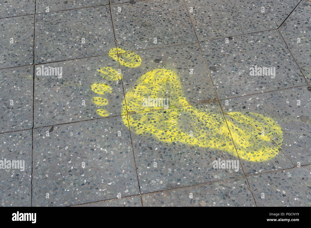 Berlin, Germany, July 14, 2018: Graphical Representation of Footprint on Tiled Flooring Stock Photo