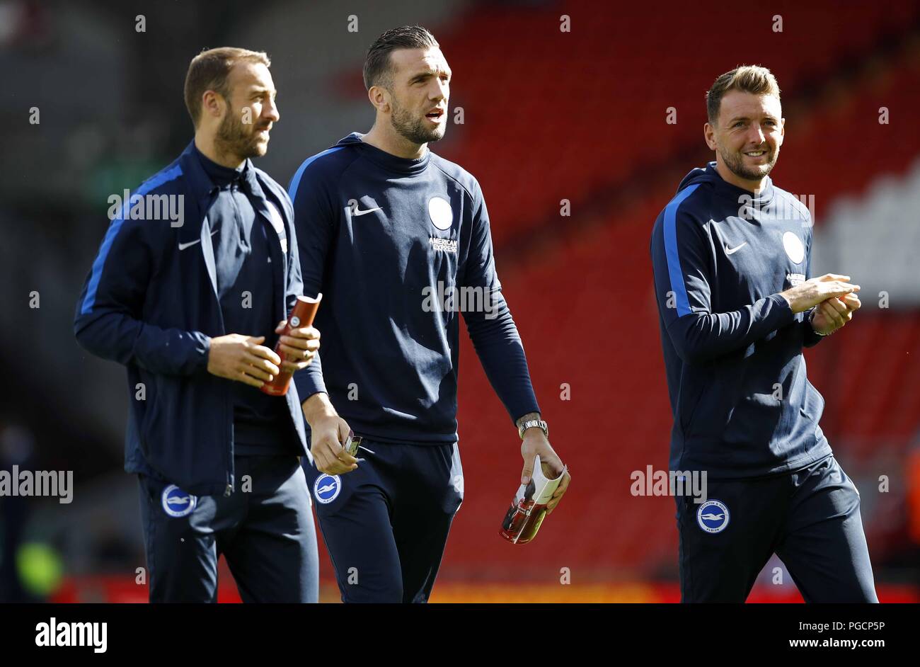 Brighton & Hove Albion's (left to right) Glenn Murray, Shane Duffy and Dale Stephens before the Premier League match at Anfield, Liverpool. Stock Photo