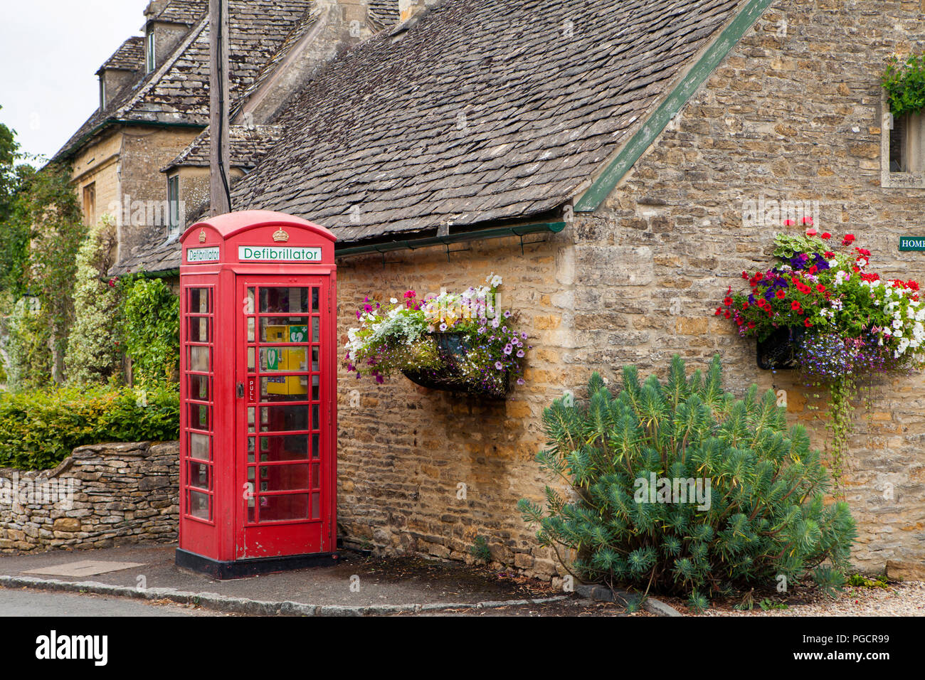 Old phone booth in Upper Slaughter, Cotswolds, England Stock Photo