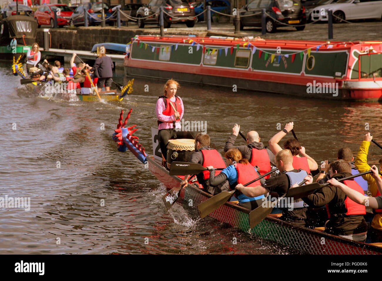 Glasgow, Scotland, UK. 25th  August, 2018. UK Weather: Brighter weather sees locals locals come out for the Scottish canal festival at Speirs wharf on the forth and Clyde canal for the highlight of the day the dragon boat race.. Gerard Ferry/Alamy news Stock Photo