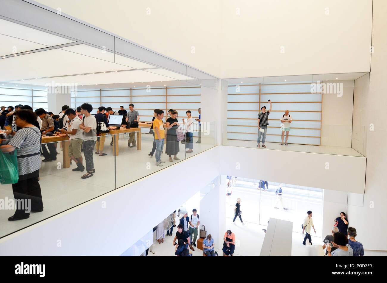 Locals And Tourists Explore The Kyoto Apple Store On The