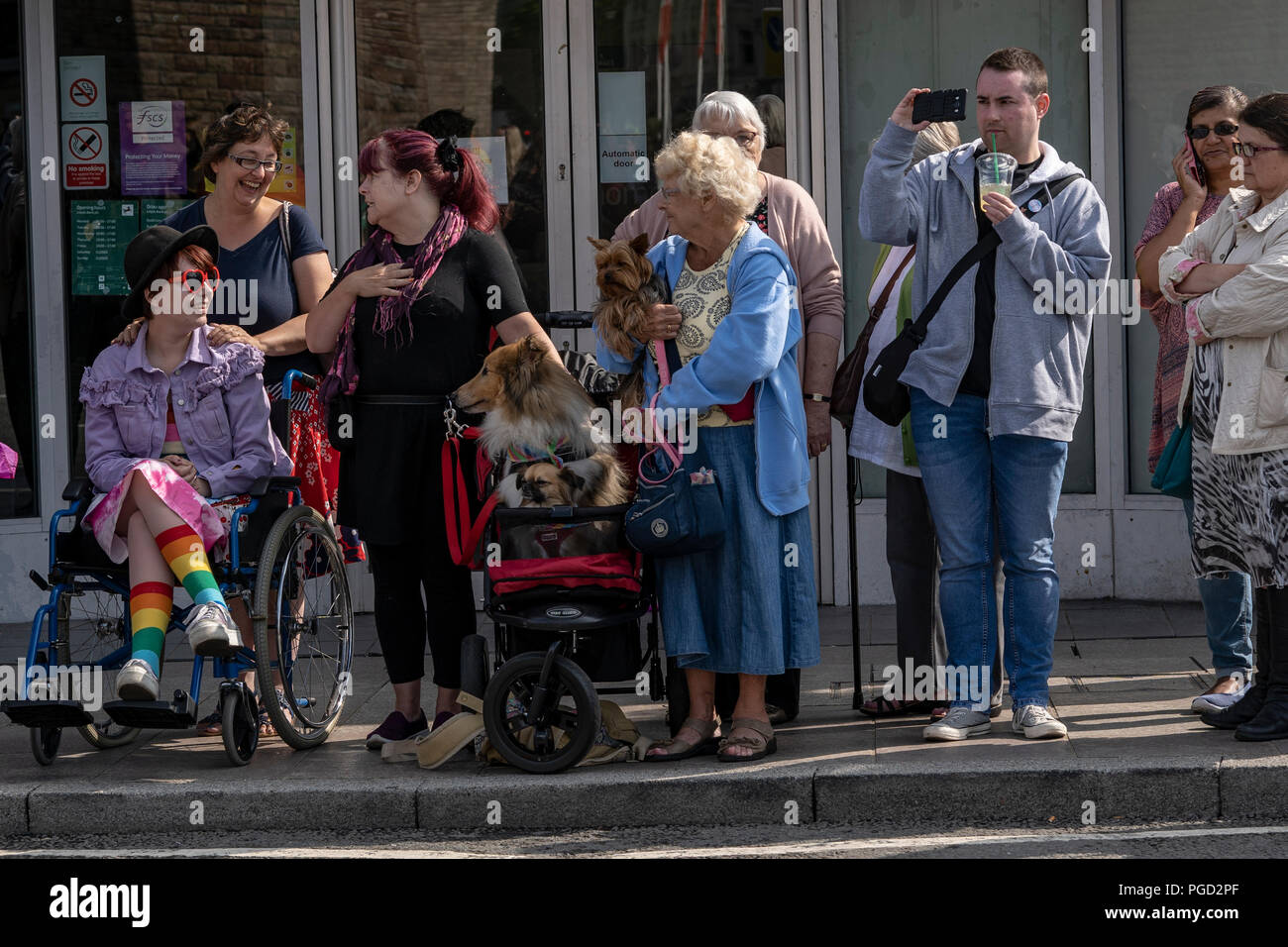 Cardiff, Wales, August 25, 2018:Spectators participate at the  Annual Pride Cymru Parade  in Cardiff, Wales on August 25, 2018 ©Daniel Damaschin Credit: Daniel Damaschin/Alamy Live News Stock Photo