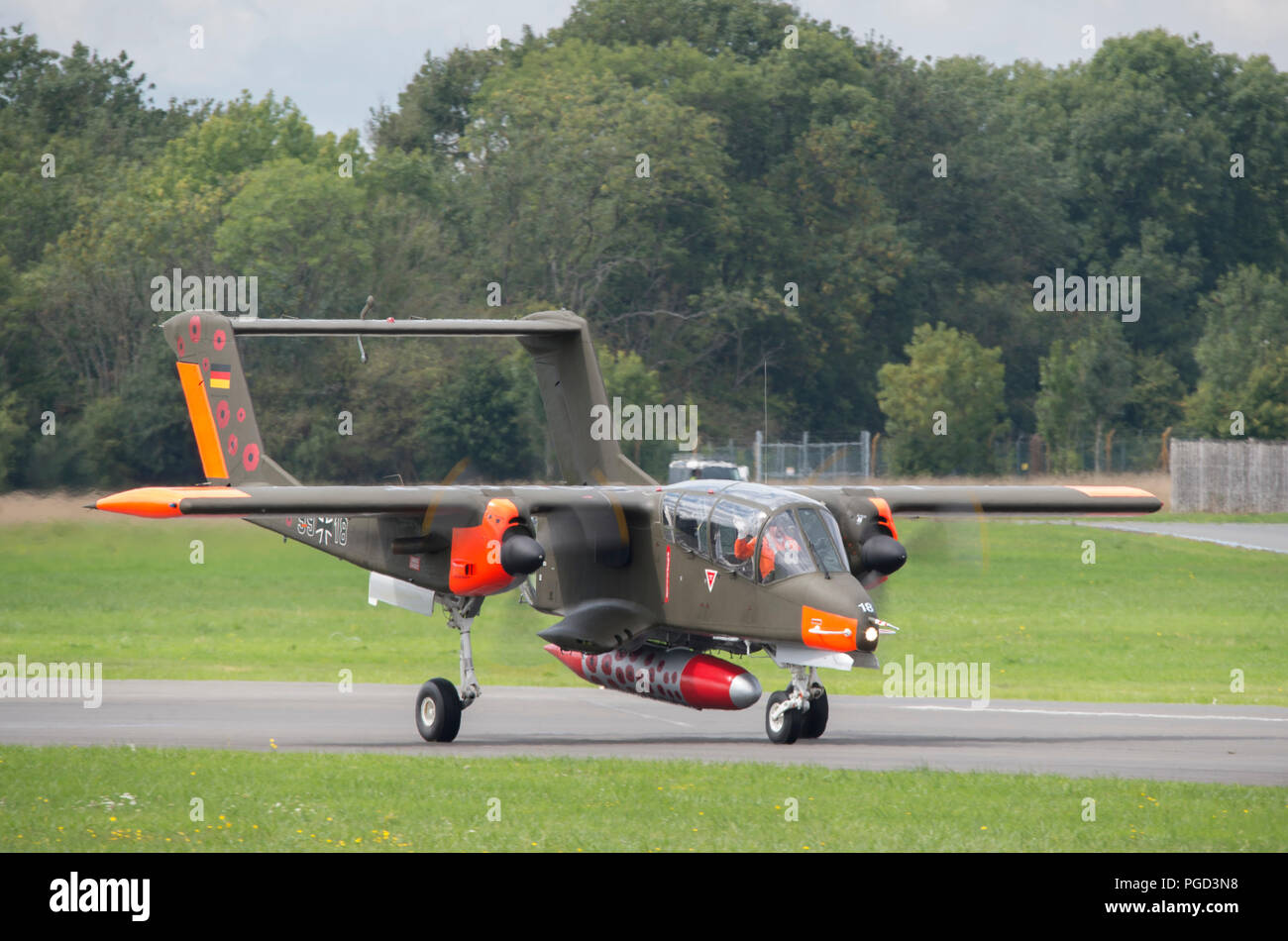 Dunsfold Park, Surrey, UK. 25 August, 2018. Weekend iconic aviation and motoring show at Dunsfold features flying displays and modern, classic & vintage supercars. Weather changes may curb may flying activities on Sunday 26 August as heavy rain is forecast. Credit: Malcolm Park/Alamy Live News. Stock Photo
