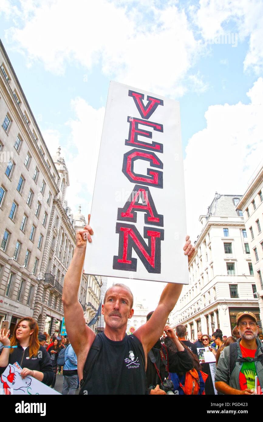 London, UK. 25th Aug 2018. Approximately ten thousand people marched from Millbank in central London to Hyde Park this afternoon, to protest against the cruelty to animals in the food chain and to promote veganism, the march was peaceful but noisy and vibrant. Credit: Natasha Quarmby/Alamy Live News Stock Photo