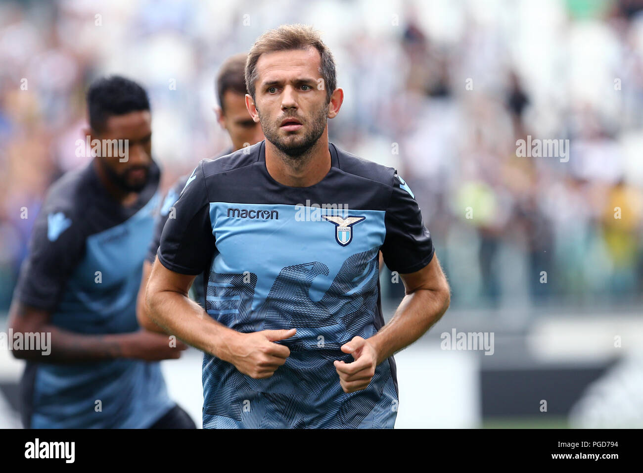 Torino, Italy. 25th August, 2018. Senad Lulic  of SS Lazio during the Serie A football match between Juventus Fc and SS Lazio.  Credit: Marco Canoniero / Alamy Live News  . Credit: Marco Canoniero/Alamy Live News Stock Photo
