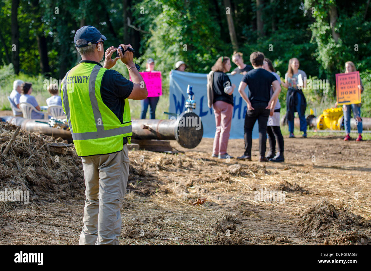 Pennsylvania, USA. 25 August 2018.  Residents held a bake sale at a pipeline construction site close to Glenwood Elemenary School in Middletown Township in protest of Sunoco's Mariner East Pipeline that threatens the safety of residents, students and daycare centers through a densley populated area. Three people were eventually arrested by state police for refusing to disperse following a lawful order. August 25 2018. Photo Credit: Chris Baker Evens. Credit: Christopher Evens/Alamy Live News Stock Photo