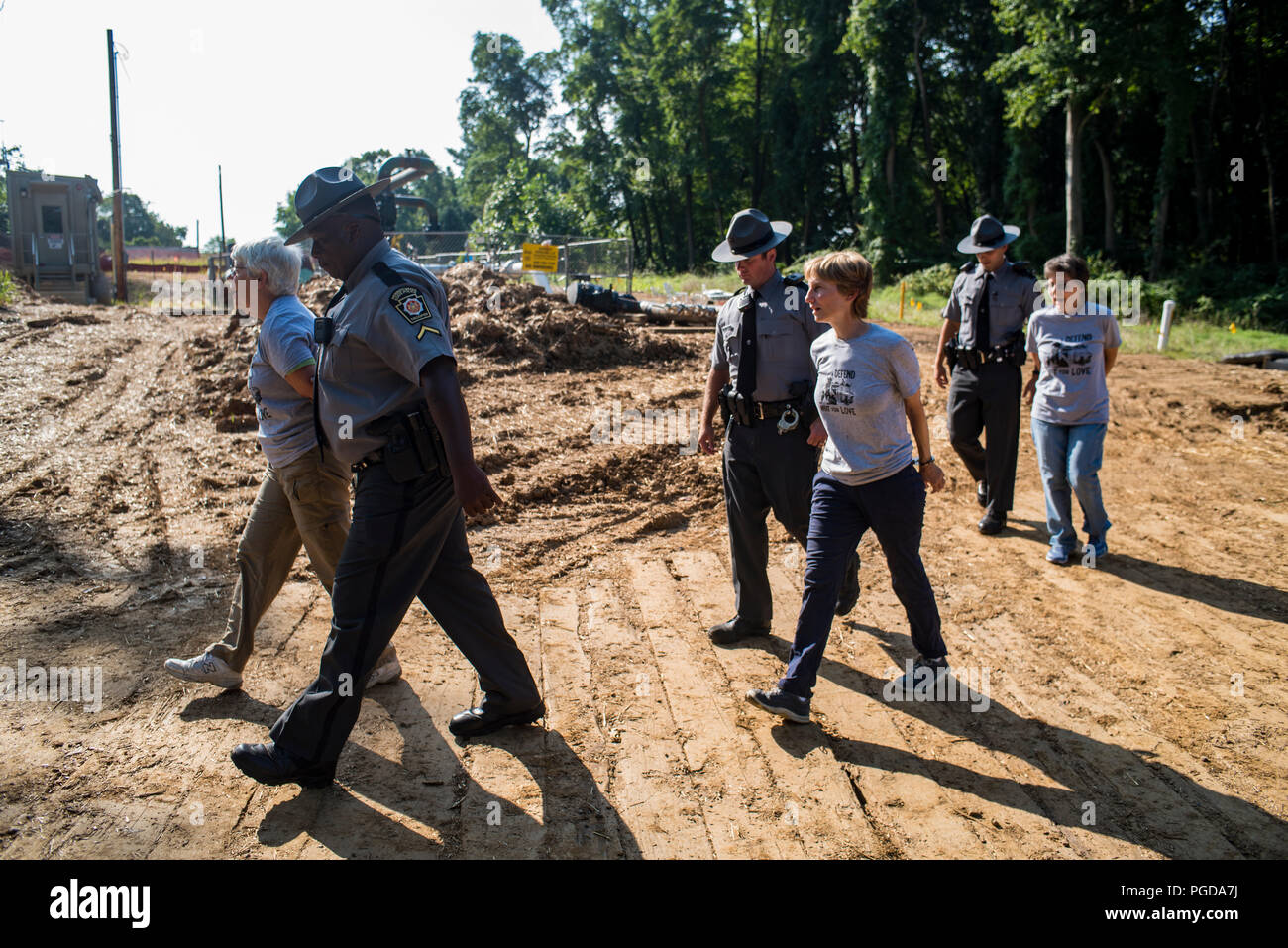Pennsylvania, USA. 25 August 2018.  Residents held a bake sale at a pipeline construction site close to Glenwood Elemenary School in Middletown Township in protest of Sunoco's Mariner East Pipeline that threatens the safety of residents, students and daycare centers through a densley populated area. Three people were eventually arrested by state police for refusing to disperse following a lawful order. August 25 2018. Photo Credit: Chris Baker Evens. Credit: Christopher Evens/Alamy Live News Stock Photo