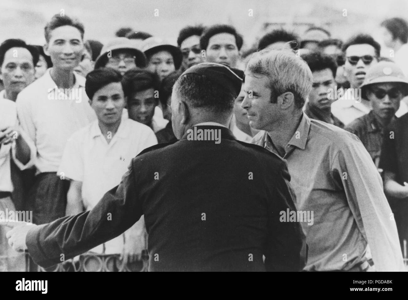 Mar 14, 1973 - Hanoi, Vietnam - JOHN MCCAIN on his release from captivity in North Vietnam. John Sidney McCain III (born August 29, 1936) is the senior United States Senator from Arizona and presumptive Republican Party nominee for President of the United States in the upcoming 2008 election. During the Vietnam War, he nearly lost his life in the 1967 USS Forrestal fire. Later that year while on a bombing mission over North Vietnam, he was shot down, badly injured, and captured as a prisoner of war by the North Vietnamese. He spent five and a half years as a prisoner of war, experiencing episo Stock Photo