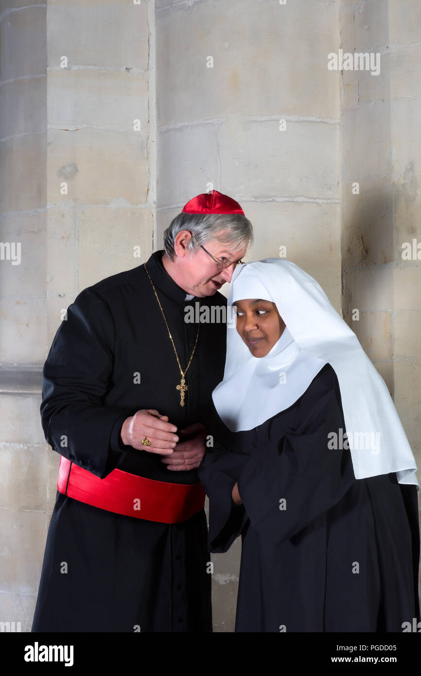 Catholic nun and cardinal talking in a medieval church Stock Photo - Alamy